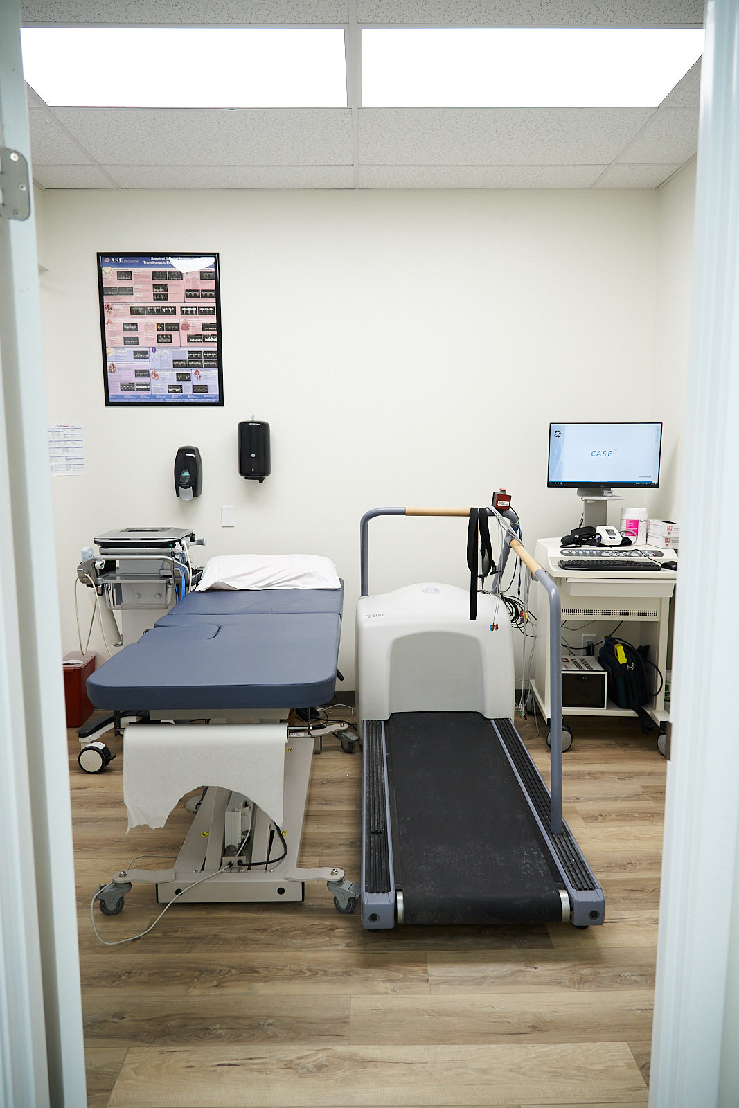 A clinic room equipped for cardiac stress testing